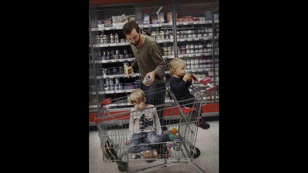 Marcus Bergqvist, 33, shops with his sons Ted and Sigge.
