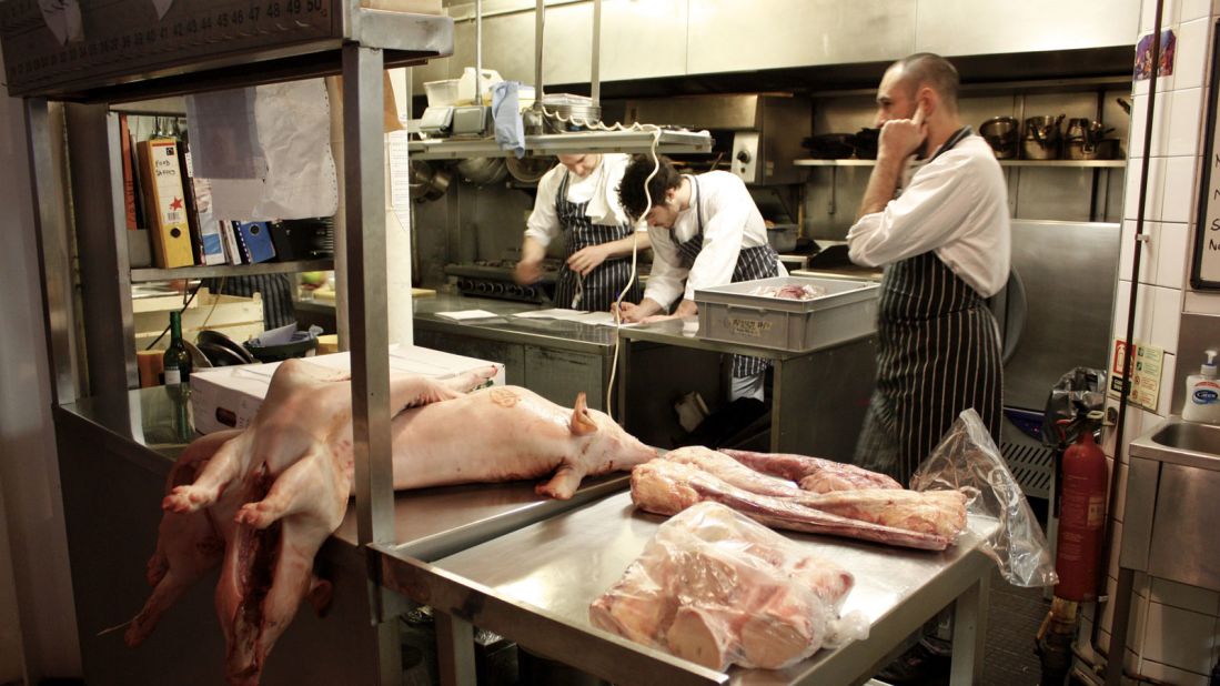 Chefs at St. John restaurant prepare for lunch service. The restaurant, based in an old smoke house, was awarded a Michelin star in 2012.
