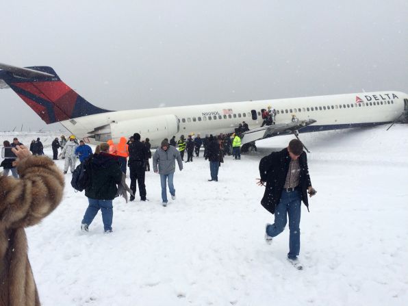 Passengers walk away from a Delta Air Lines plane <a href="http://www.cnn.com/2015/03/05/us/new-york-plane-runway/index.html" target="_blank">after it skidded off the runway</a> while landing at New York's LaGuardia Airport on Thursday, March 5. The plane busted through a fence before coming to a stop just a few feet away from the frigid East River. There were 24 people hurt in the landing, but none of the injuries was life-threatening.