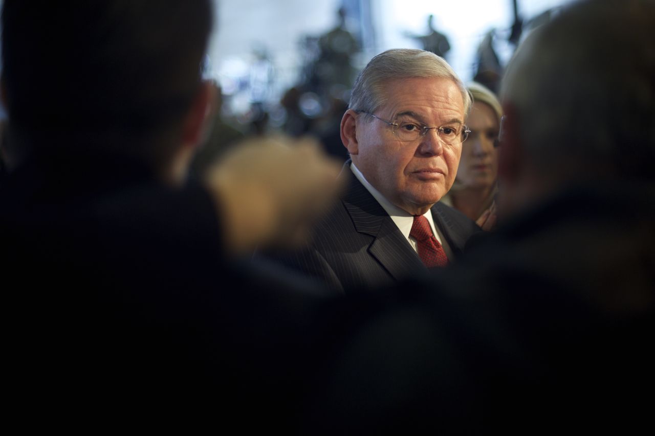 Senator Robert Menendez addresses the media in advance of an event with President Barack Obama December 15, 2014 at Joint Base McGuire-Dix-Lakehurst, New Jersey.