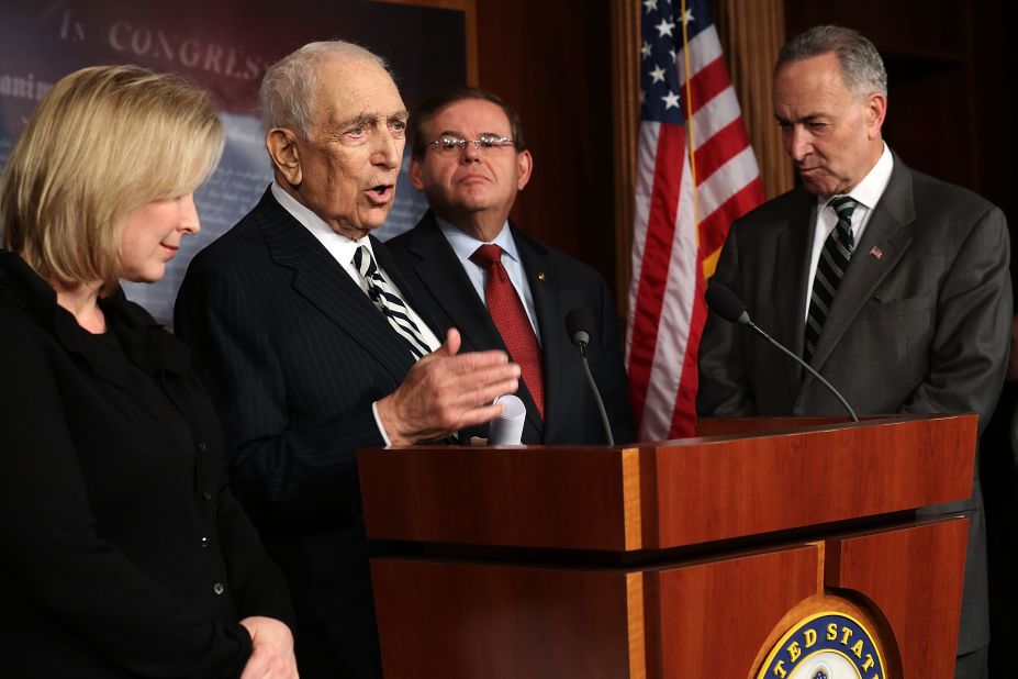 Sen. Frank Lautenberg (D-NJ) (second left) speaks as (left to right) Sen. Kirsten Gillibrand (D-NY), Sen. Robert Menendez (D-NJ), and Sen. Charles Schumer (D-NY) listen during a news conference after a vote on the Superstorm Sandy Relief Bill January 28, 2013 on Capitol Hill in Washington.