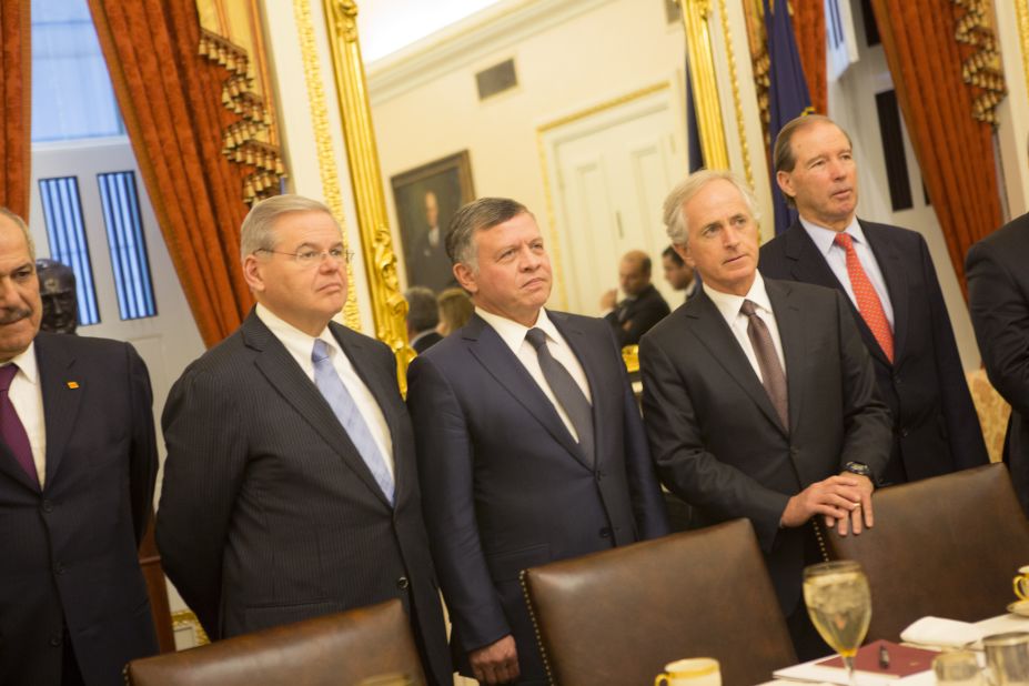 King Abdullah II of Jordan (third left) poses for a photo before meeting with members of the U.S. Foreign Relations Committee, including Sen. Robert Menendez (D-NJ) (second left) and Sen. Bob Corker (R-TN) (second right) February 3, 2015 on Capitol Hill in Washington, D.C. 