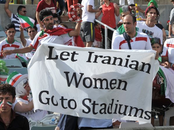 Iranian supporters display a banner calling for an end to Iran's stadium ban on women during the Asian Cup quarterfinal in Canberra.