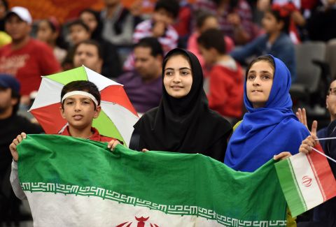 Fans cheer Iran on during the Asian Cup quarterfinal against Iraq in Australia.