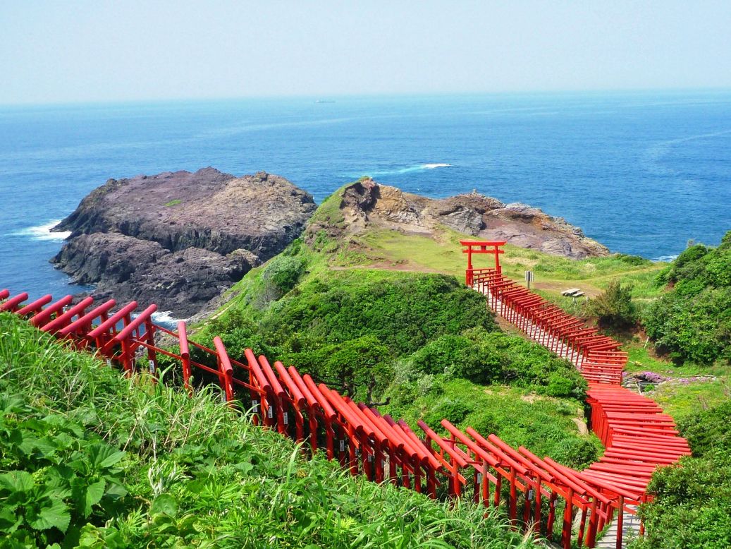 <strong>Motonosumi-inari Shrine (Yamaguchi): </strong>The 123 Torii gates stretches from the Motonosumi-Inari Shrine to the cliff overlooking the ocean. Motonosumi-Inari is a popular shrine where locals wish for success. The final Torii's donation box is placed out of reach at the top of the gate. It's believed that if you can successfully toss money into the box, all your wishes will come true.
