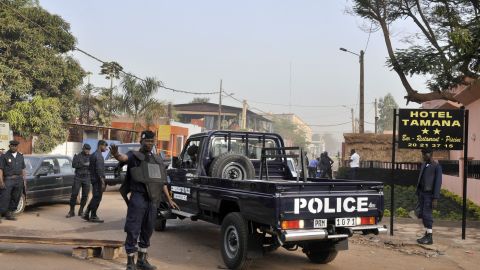 Police block the street near the site of Saturday's deadly shooting in Bamako, Mali.