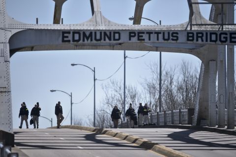U.S. Secret Service snipers inspect the Edmund Pettus Bridge.