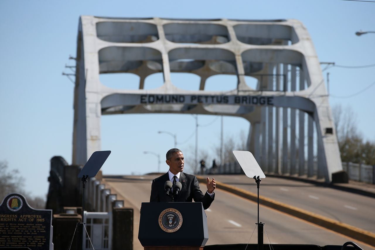 President Barack Obama speaks in front of the Edmund Pettus Bridge during ceremonies commemorating the "Bloody Sunday" confrontation between civil rights marchers and state troopers at the bridge 50 years ago.