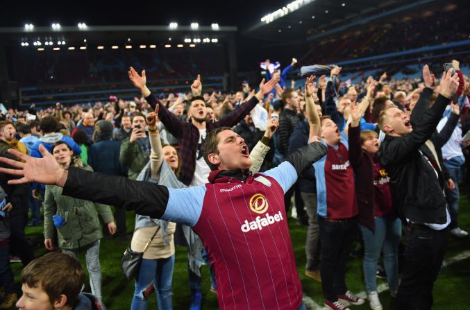 Thousands of Aston Villa fans celebrate on the turf of Villa Park at the fulltime whistle. Their side will now travel to Wembley for the FA Cup semifinals next month.
