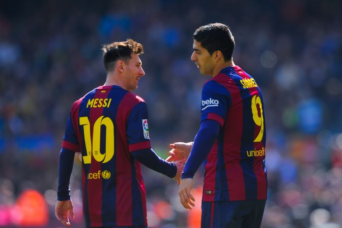 Luis Suarez (right) celebrates with Lionel Messi after scoring Barcelona's opening goal in the 6-1 win at home to Rayo Vallecano on March 8.
