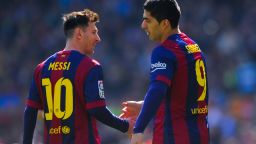 Luis Suarez (R) of FC Barcelona celebrates with his teammate Lionel Messi of FC Barcelona after scoring the opening goal during the La Liga match between FC Barcelona and Rayo Vallecano de Madrid at Camp Nou on March 8, 2015 in Barcelona, Spain. (Photo by David Ramos/Getty Images