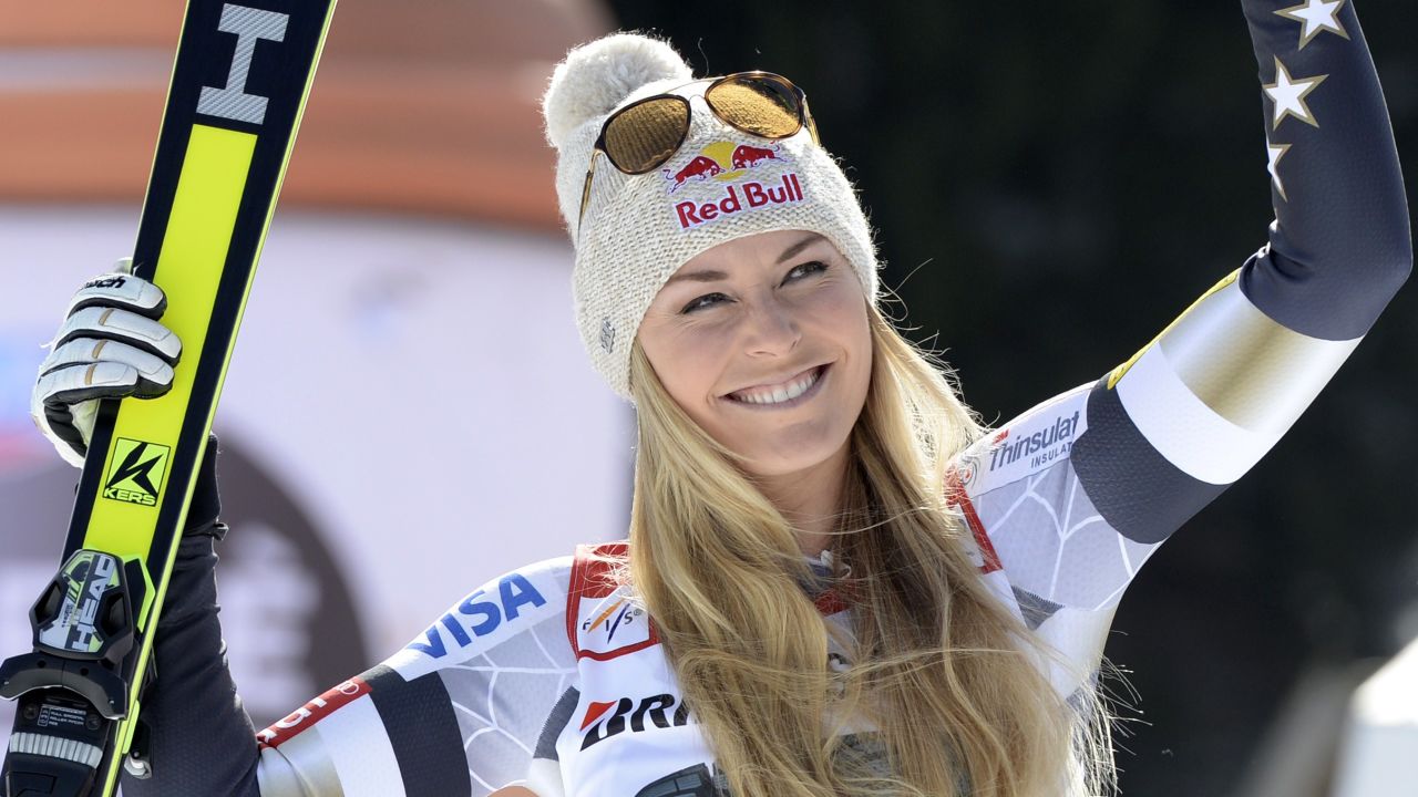 US Lindsey Vonn waves during the winner ceremony of the women's Super G competition of the FIS alpine ski world cup in Garmisch-Partenkirchen, southern Germany, on March 8, 2015. US Lindsey Vonn won the competition, Slovenian Tina maze placed second and Austrian Anna Fenninger placed third. AFP PHOTO / CHRISTOF STACHE (Photo credit should read CHRISTOF STACHE/AFP/Getty Images