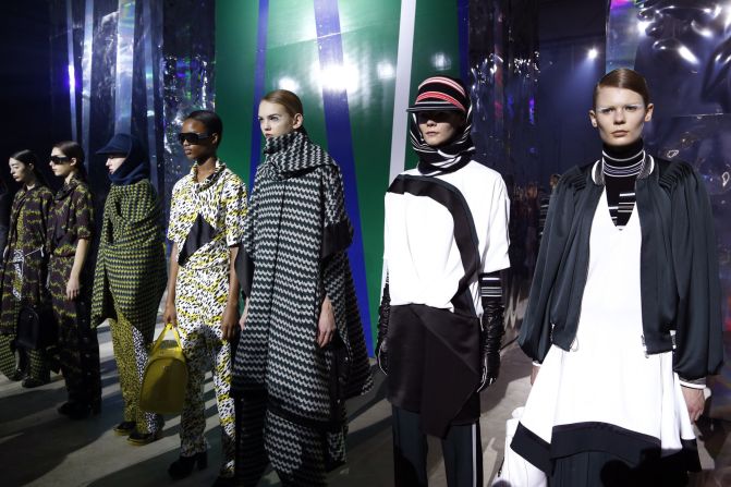 The backdrop at Kenzo was a series of massive holographic columns on wheels that moved around the runway.