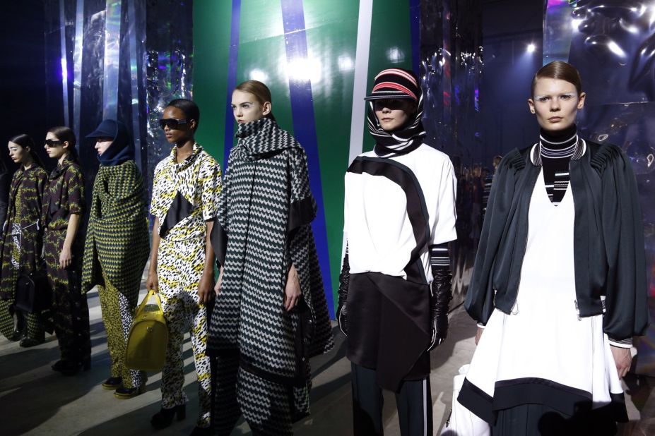 The backdrop at Kenzo was a series of massive holographic columns on wheels that moved around the runway.