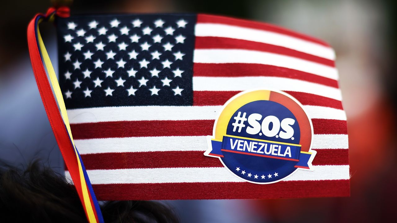 CNNE getty us flag venezuela sos unrest protest sticker