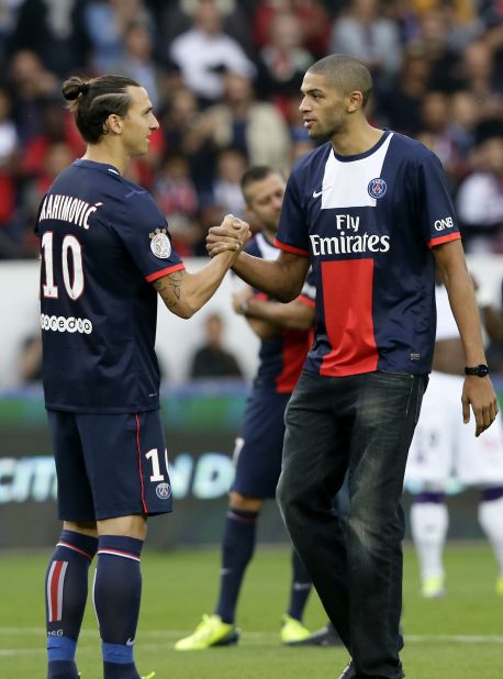 Charlotte Hornets star Nicolas Batum has a sister who lived in an area affected by the Paris attacks. Here he is pictured right with footballer Zlatan Ibrahimovic before a Paris Saint-Germain game in 2013. 