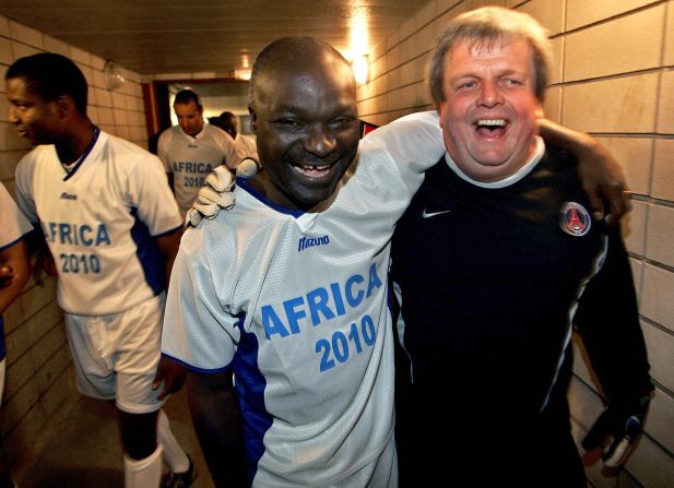 Former player and official Jean-Michel Moutier, pictured here with Cameroon legend Roger Milla, believes "the true value of sport is that everyone is there thanks to their talent and work."