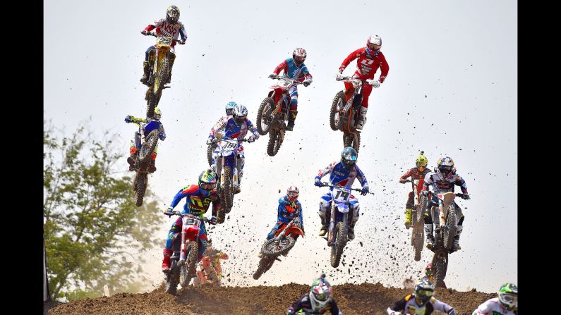 Motocross riders race during the MXGP event in Bangkok, Thailand, on Sunday, March 8.