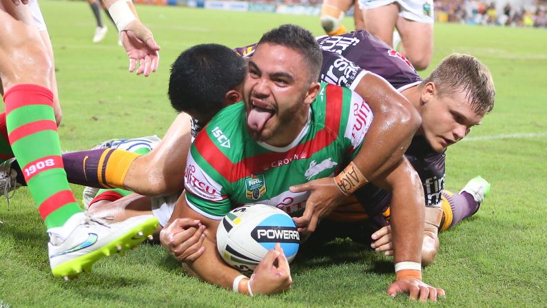 Dylan Walker of the South Sydney Rabbitohs sticks out his tongue after scoring a try against the Brisbane Broncos during a National Rugby League match Thursday, March 5, in Brisbane, Australia. The Rabbitohs, the defending league champions, won 36-6.