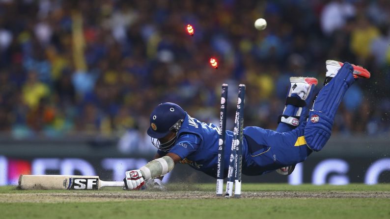 Mahela Jayawardene of Sri Lanka is run out by Michael Clarke of Australia during a Cricket World Cup match Sunday, March 8, in Sydney. Australia won the match by 64 runs.