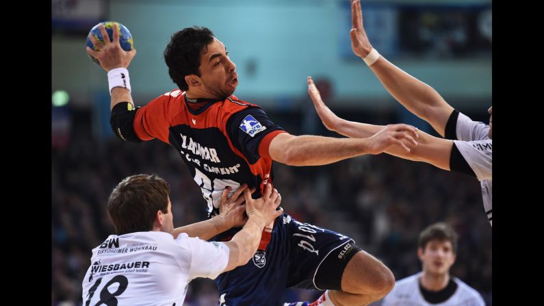 Ahmed El-Ahmar, a handball player with German club Flensburg-Handewitt, throws a goal during a Bundesliga match against BBM Bietigheim on Sunday, March 8.