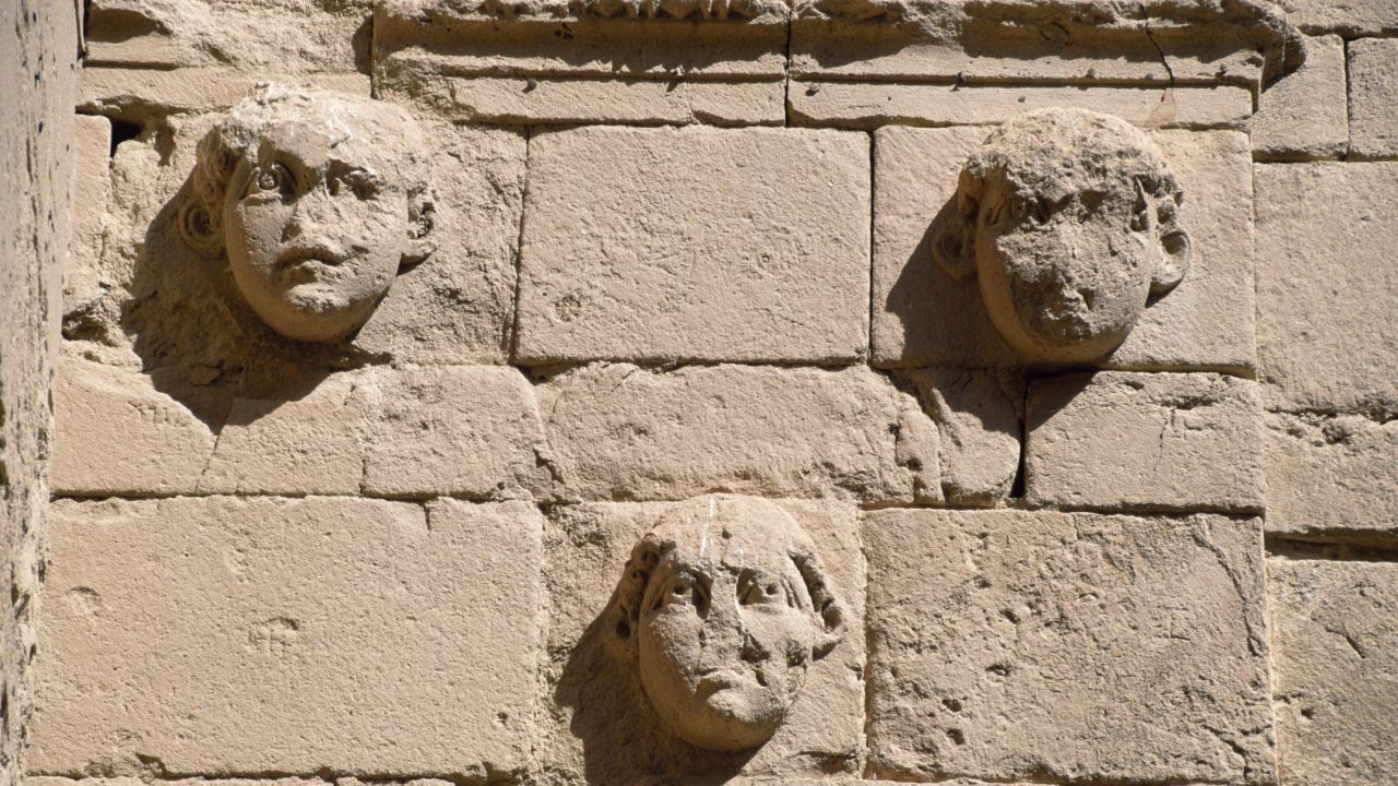 Bas-reliefs of masks in Hatra