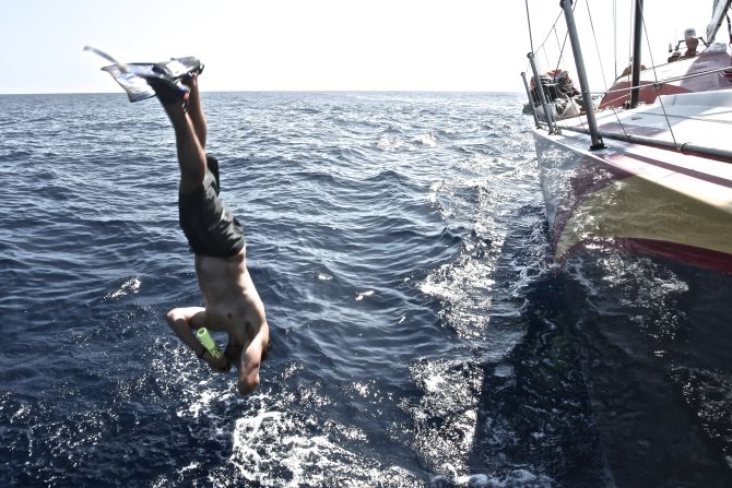 It might look like he's taking time out. But sailor Daryl Wislang is diving into the water to clear debris from the keel fin in the hope of increasing speed as the team Abu Dhabi Ocean Racing heads towards the finish line in Sanya, China.