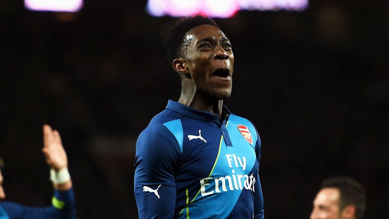 Danny Welbeck celebrates is winning goal for Arsenal in the FA Cup quarterfinal tie at Manchester United.