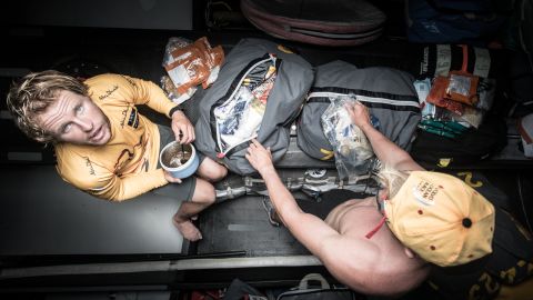 Sailors Luke "Parko" Parkinson and Alex Higby raid the spare food bags during leg 4, between China and New Zealand. 