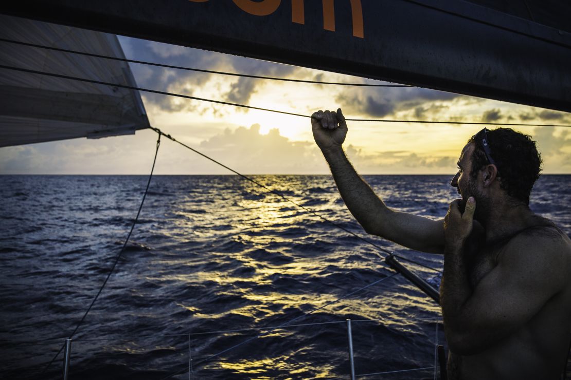 Sailor Seb Marsset looks across the ocean. Over the equator and into the Southern Hemisphere, the weather turns tropical, with rainclouds driving much of the day's movement south towards Vanuatu.