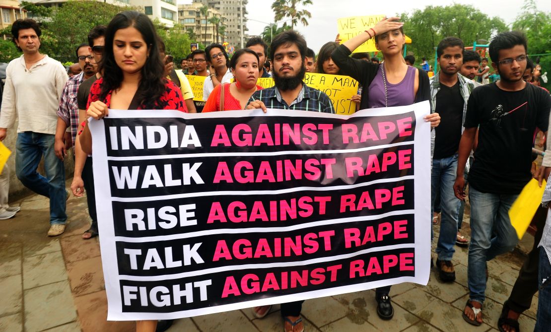 Indian Bollywood stars take part in a protest march against the gang-rape of a female photographer in Mumbai on August 25, 2013. 