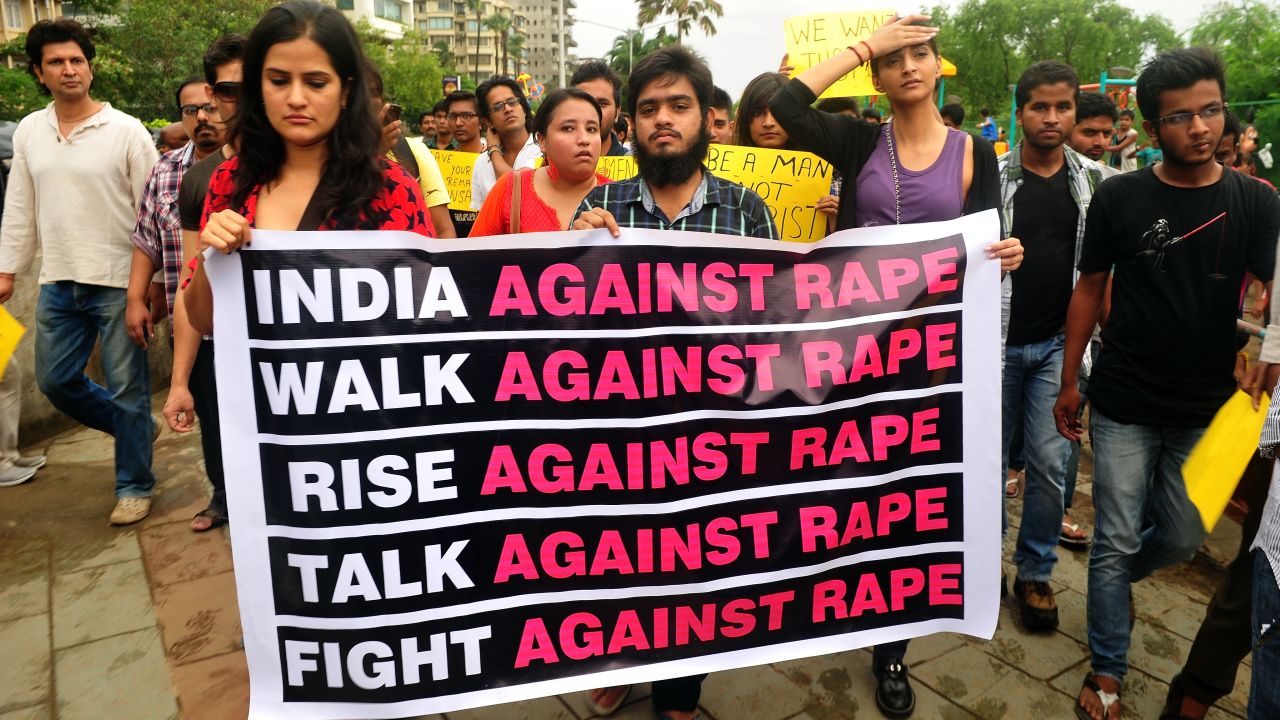 Indian Bollywood stars take part in a protest march against the gang-rape of a female photographer in Mumbai on August 25, 2013.
