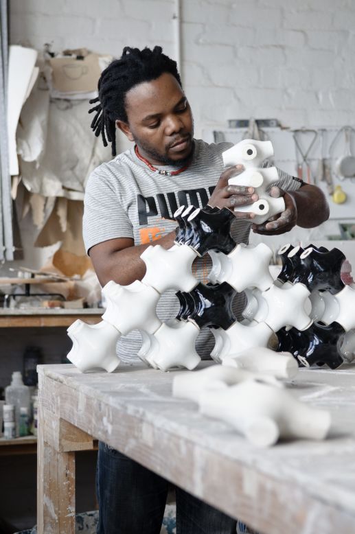 The founder of Imiso Ceramics was born in 1978 near Qobo-Qobo in South Africa's Eastern Cape. An accomplished ceramic designer, Andile Dyalvane prides himself as being South African. He strives for his clay art to be "beautiful, valuable and usable."