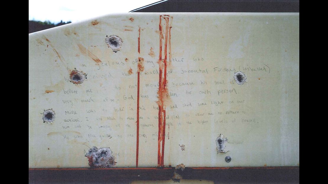 Photos of what prosecutors say are Dzhokhar Tsarnaev writings on the inside of the boat he was captured in after running from police in the aftermath of the Boston Marathon bombing.