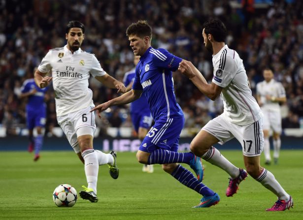 Dutch striker Klaas-Jan Huntelaar scored twice including an 84th minute winner -- but Real still went through 5-4 on aggregate.