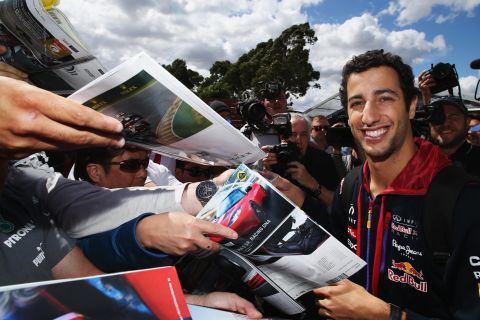 The Australian has a huge home following -- pictured are fans with Ricciardo at last year's race in Melbourne -- and he plans to use their support once again this Sunday.