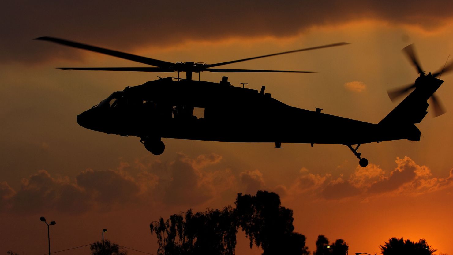 A U.S. Army Black Hawk helicopter lands in Baghdad, Iraq, Feb. 13, 2008. 