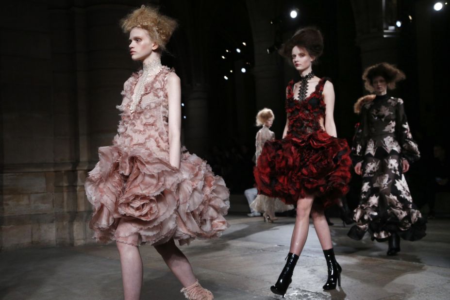 The beautiful clothes shown at Alexander McQueen evoked flowers in bloom, fading, and in decay. 