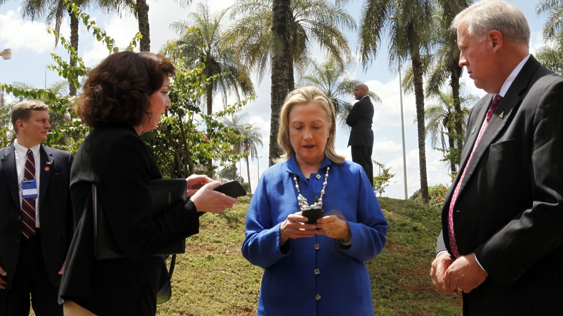 Clinton types on her phone during a visit to Brasilia, Brazil, in April 2012.