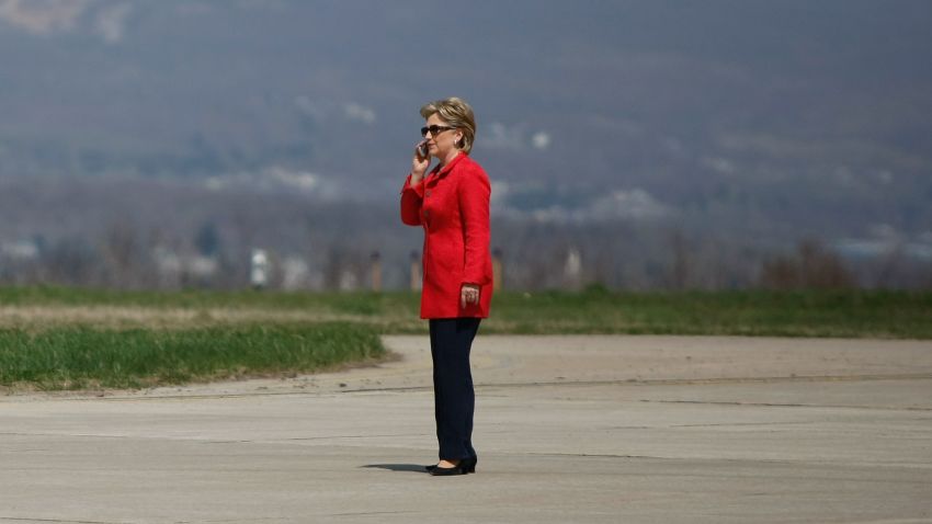 Democratic presidential hopeful U.S. Senator Hillary Clinton (D-NY) speaks on the cell phone as she waits to get on her plane at the Scranton airport after holding a campaign rally in the Scranton Cultural Center April 21, 2008 in Scranton, Pennsylvania. 