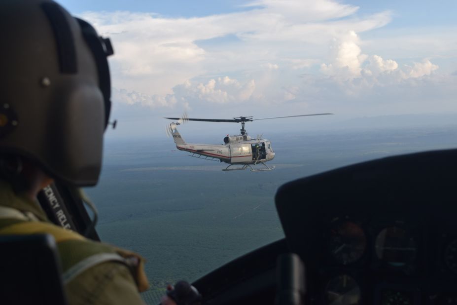Guatemalan National Civil Police helicopters fly over Petén Province in northern Guatemala in search of illegal runways used by drug traffickers and smugglers.