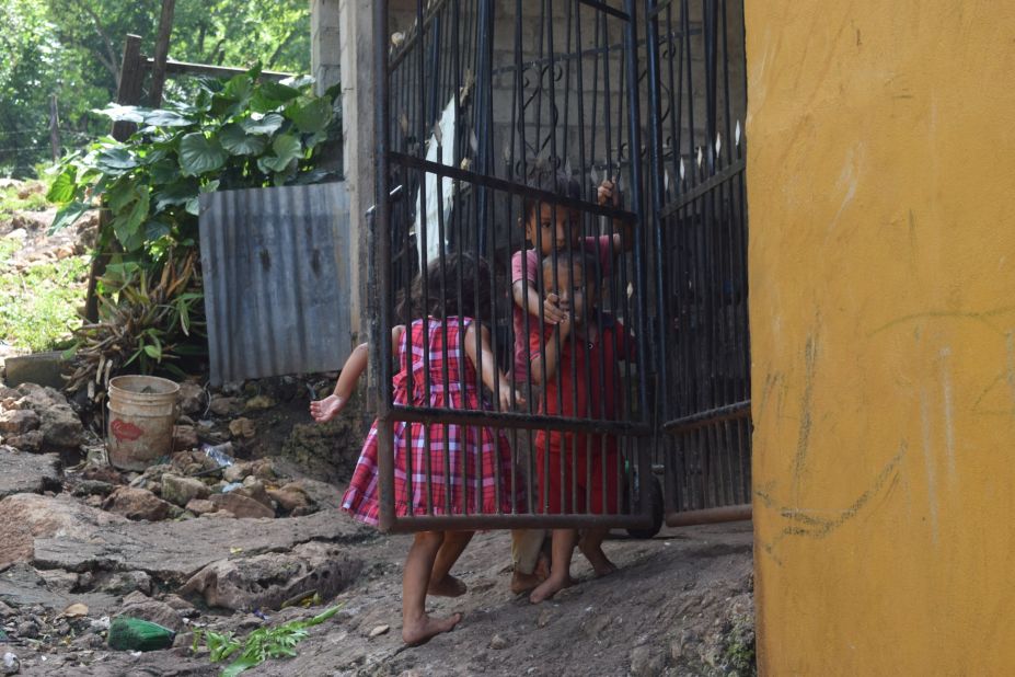 Guatemalan children play outside their home in El Ceibo, a town across the border from Mexico in the Petén province.