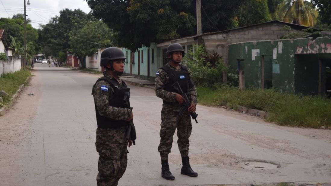 Members of the Honduran Military Police patrol the Chamelecón neighborhood in San Pedro Sula, the city with the highest murder rate in the world.
