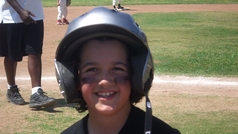 Avery plays baseball at age 8 in 2008. Avery says that his parents never tried to change him or make him act a certain way.<br />