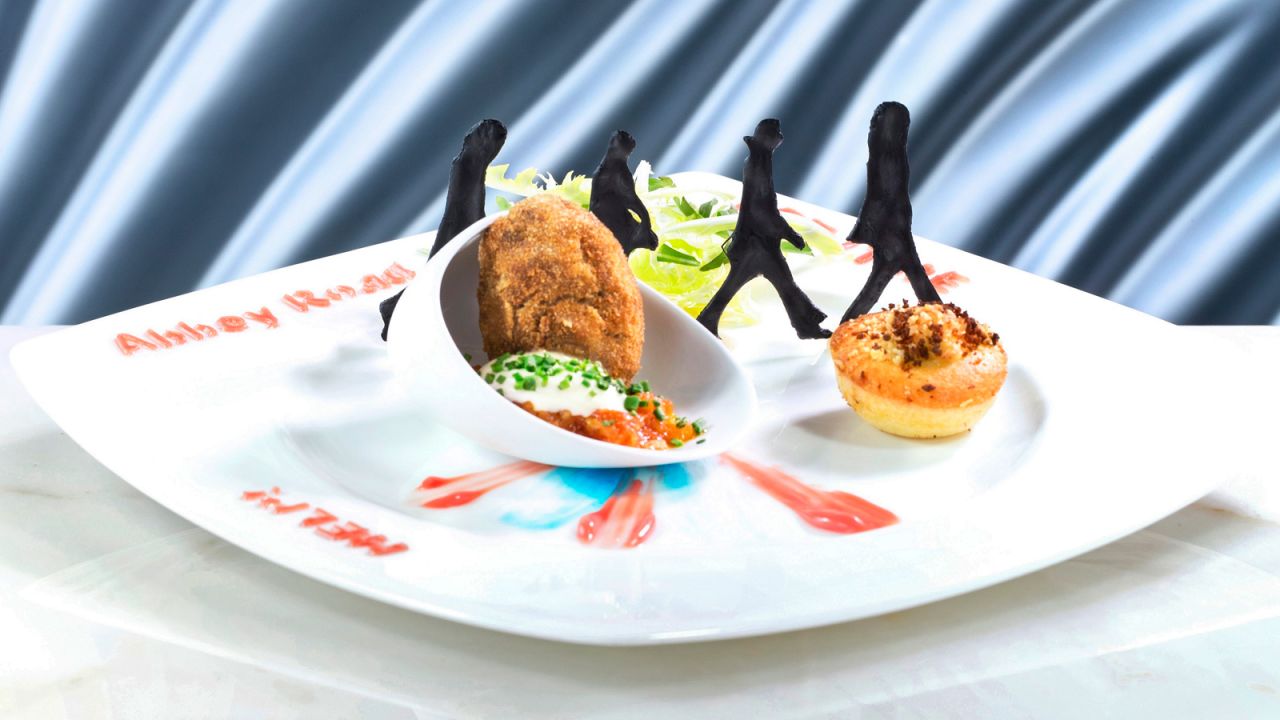 It doesn't take a genius to work this one out. Felix's art menu first course is themed England and music. <br />It features scotch egg with tomato sauce and cheese and bacon muffin and some not-so-subtle references to the famous Liverpool band.<br /><a href="http://hongkong.peninsula.com/en/fine-dining/felix" target="_blank" target="_blank"><em>Felix</em></a><em>, 28/F, The Peninsula Hong Kong, Salisbury Road, Kowloon, Hong Kong</em> 