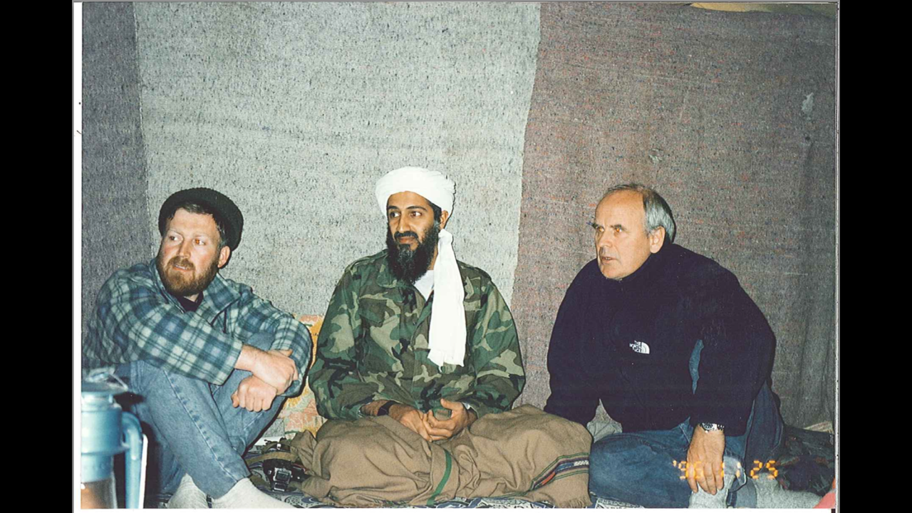 From left, inside bin Laden's cave, are al-Suri, bin Laden and British documentary maker Gwynne Roberts.