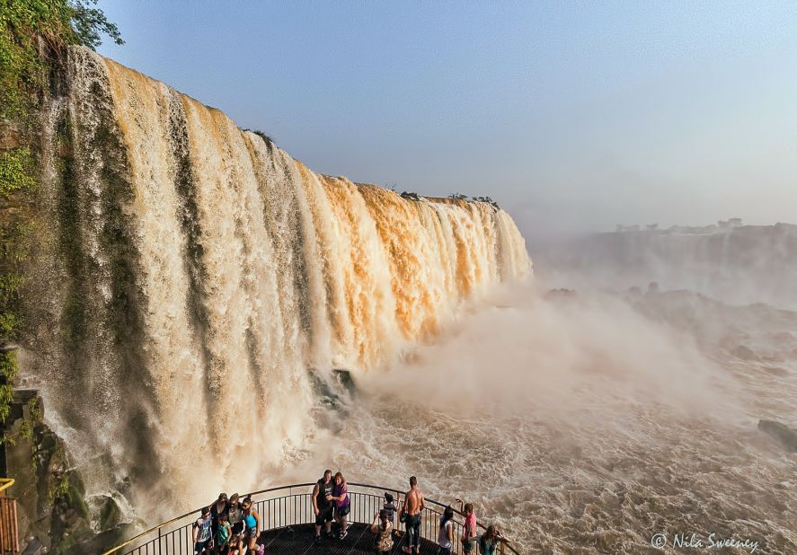 The best time to visit the Iguazu Falls is early in the morning before crowds arrive. 