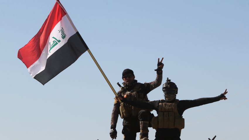 Iraqi government forces take part in a military operation on the western outskirts of the Iraqi city of Tikrit, 160 kms north of Baghdad, to retake control of the city from jihadists from the Islamic state (IS) group, on March 11, 2015. Iraqi forces entered a northern neighbourhood of Tikrit, marking a new stage in the operation launched 10 days ago to wrest the city back from jihadists, army officers said. AFP PHOTO / AHMAD AL-RUBAYE (Photo credit should read AHMAD AL-RUBAYE/AFP/Getty Images)