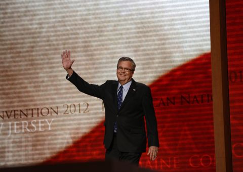 Bush waves to the audience at the Tampa Bay Times Forum in Tampa, Florida, on August 30, 2012, on the final day of the Republican National Convention.