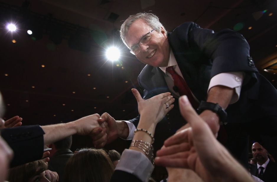 Former Florida governor Jeb Bush shakes hands with attendees after speaking at the 42nd annual Conservative Political Action Conference on February 27 in National Harbor, Maryland. 
